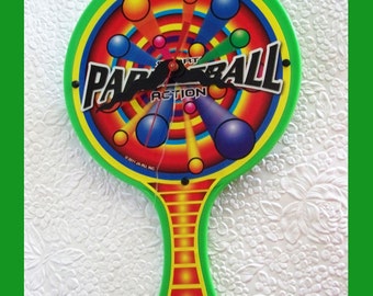 Paddle Ball Wall Clock