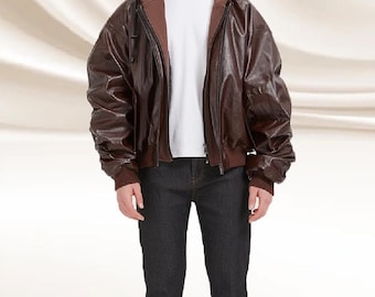 Chaqueta bomber oversize de piel de oveja: corte holgado para hombre, capucha desmontable