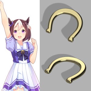 May include: Two gold-coloured horseshoe charms with a shadow on a grey background. The horseshoe charms are in a U-shape with a rectangular base. A cartoon character in a purple and white dress is on the left side of the image.