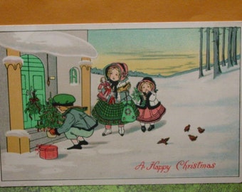 Christmas Postcard Girls with Toys & Doll, Boy with Christmas Tree - Vintage Postcard
