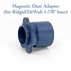 May include: A navy blue magnetic dust adapter for Ridgid/DeWalt 1-7/8" hose. The adapter has a cylindrical shape with a flared end and a textured surface. The text "Magnetic Dust Adapter" is printed above the adapter.