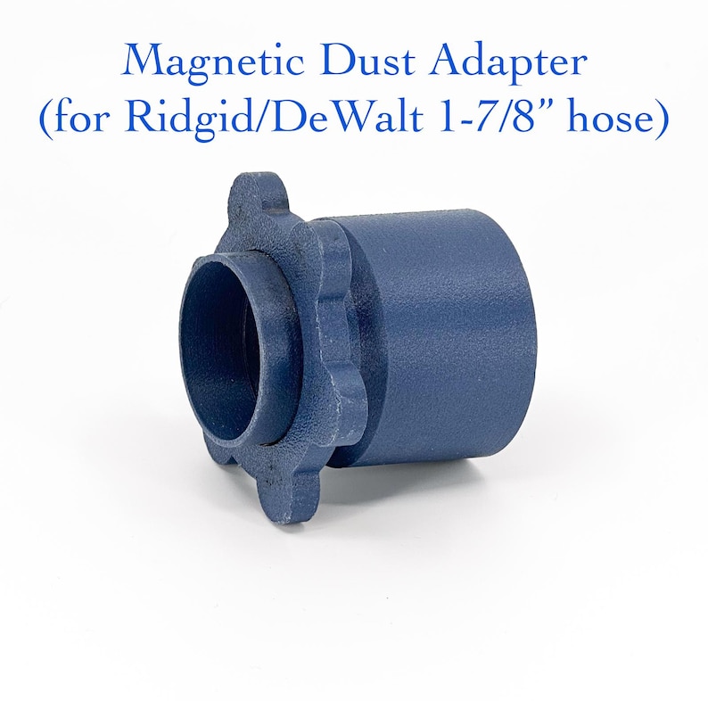 May include: A navy blue magnetic dust adapter for Ridgid/DeWalt 1-7/8" hose. The adapter has a cylindrical shape with a flared end and a textured surface. The text "Magnetic Dust Adapter" is printed above the adapter.