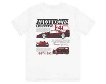 May include: White t-shirt featuring a maroon illustration of a Ferrari F40, with the text "Automotive Collective F40" and the production years "1987-1992". The design includes multiple views of the car.