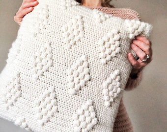 white crochet pillow