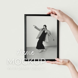Black frame mockup, Minimalist mockup, Modern vertical DIN A poster mock-up with person hanging on wall, PSD template smart object 3:4 Ratio