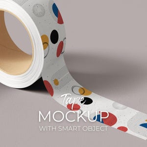 May include: A roll of decorative tape with a white background and a repeating pattern of colorful geometric shapes. The tape has red, yellow, black, and blue shapes. The text "Tape MOCKUP WITH SMART OBJECT" is printed on the tape.