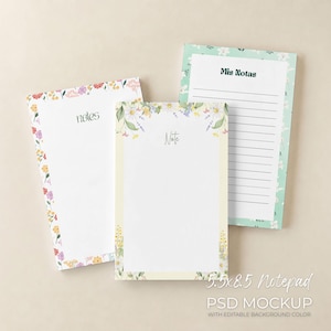 May include: Three floral-themed notepads. The notepads are 14 x 21.6 cm. One notepad has the word "Notes" and a floral border. Another has the word "Note" and a floral border. The third notepad has the words "Mis Notas" and lined pages.