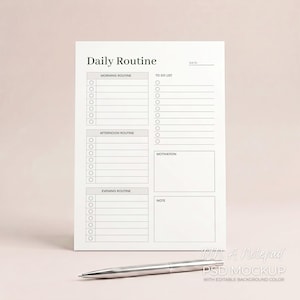 Könnte beinhalten: Ein weißer Notizblock mit dem Aufdruck "Daily Routine" oben. Der Notizblock hat Abschnitte für Morgen-, Nachmittags- und Abendroutinen, eine To-Do-Liste und Platz für Notizen. Ein silberner Stift liegt vor dem Notizblock.