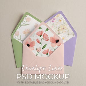 May include: Three open envelopes with floral patterned liners. The envelopes are in pastel colors: light pink, green, and lavender. The liners feature watercolor-style flowers in shades of pink, peach, and white. Text on the image reads "Envelope Liner PSD Mockup".