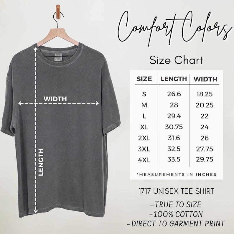 May include: A charcoal gray short-sleeve t-shirt hanging on a wooden hanger, accompanied by a Comfort Colors size chart. The chart lists sizes S through 4XL with corresponding length and width measurements in inches for the 1717 unisex tee shirt.