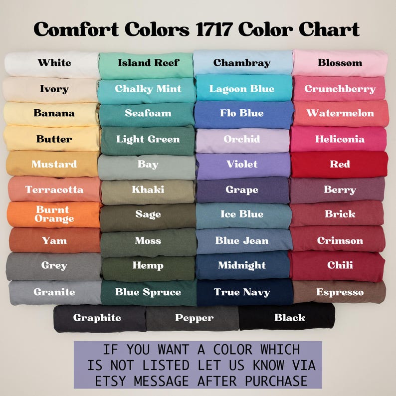 May include: A color chart displaying a variety of Comfort Colors 1717 shades, including white, blue, pink, green, and orange. The chart includes color names such as "Blossom", "True Navy", and "Burnt Orange". Text at the bottom encourages customers to inquire about colors not listed.