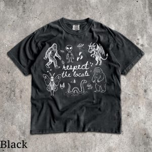 Respect The Locals T-Shirt - Vintage Men & Women's Unisex Graphic Tee - Cryptids - Bigfoot - Mothman - Aliens - Yeti - Folk Horror Shirt Black