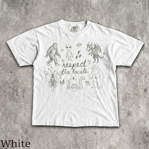 Respect The Locals T-Shirt - Vintage Men & Women's Unisex Graphic Tee - Cryptids - Bigfoot - Mothman - Aliens - Yeti - Folk Horror Shirt White