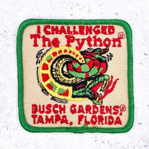 May include: A set of three ceramic mugs with a speckled, matte finish. Each mug features a different color: light blue, cream, and gray. The mugs have a simple, modern design with a rounded shape and a handle.