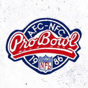 May include: Embroidered patch with a blue border, featuring "AFC-NFC Pro Bowl" in red script. The year "1986" and the NFL logo are also displayed. The patch is likely for a sports fan.