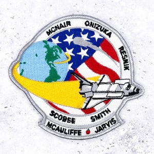 May include: A rustic wooden sign with the text "Welcome to our home" in white lettering. The sign features a distressed finish and a simple, inviting design, perfect for a front porch or entryway.