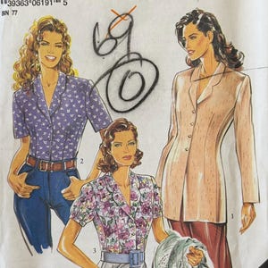 May include: A New Look sewing pattern envelope featuring illustrations of three garments: a short-sleeved purple floral blouse with blue jeans, a long-sleeved beige jacket with dark trousers, and a short-sleeved floral blouse with light trousers.