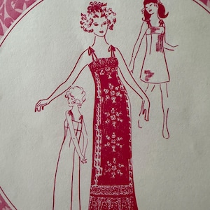 May include: A vintage illustration featuring three figures in dresses, rendered in red on a cream background. The central figure wears a long, floral-patterned gown. The other two figures are in shorter dresses. The image is framed by a decorative pink border.