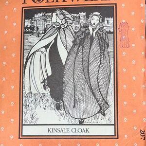 May include: An orange Folkwear pattern envelope featuring a black and white illustration of two figures wearing cloaks. The text "FOLKWEAR" is at the top, with "KINSALE CLOAK" at the bottom. The envelope has a floral pattern.