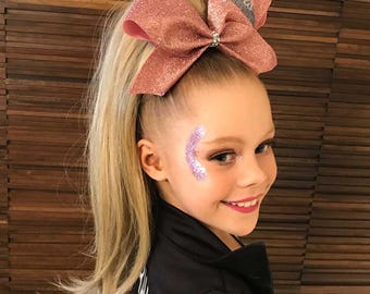 Coleta recta de 40 cm con cordón para animadoras: pelo sintético suave, aspecto natural y resistente a los enredos.