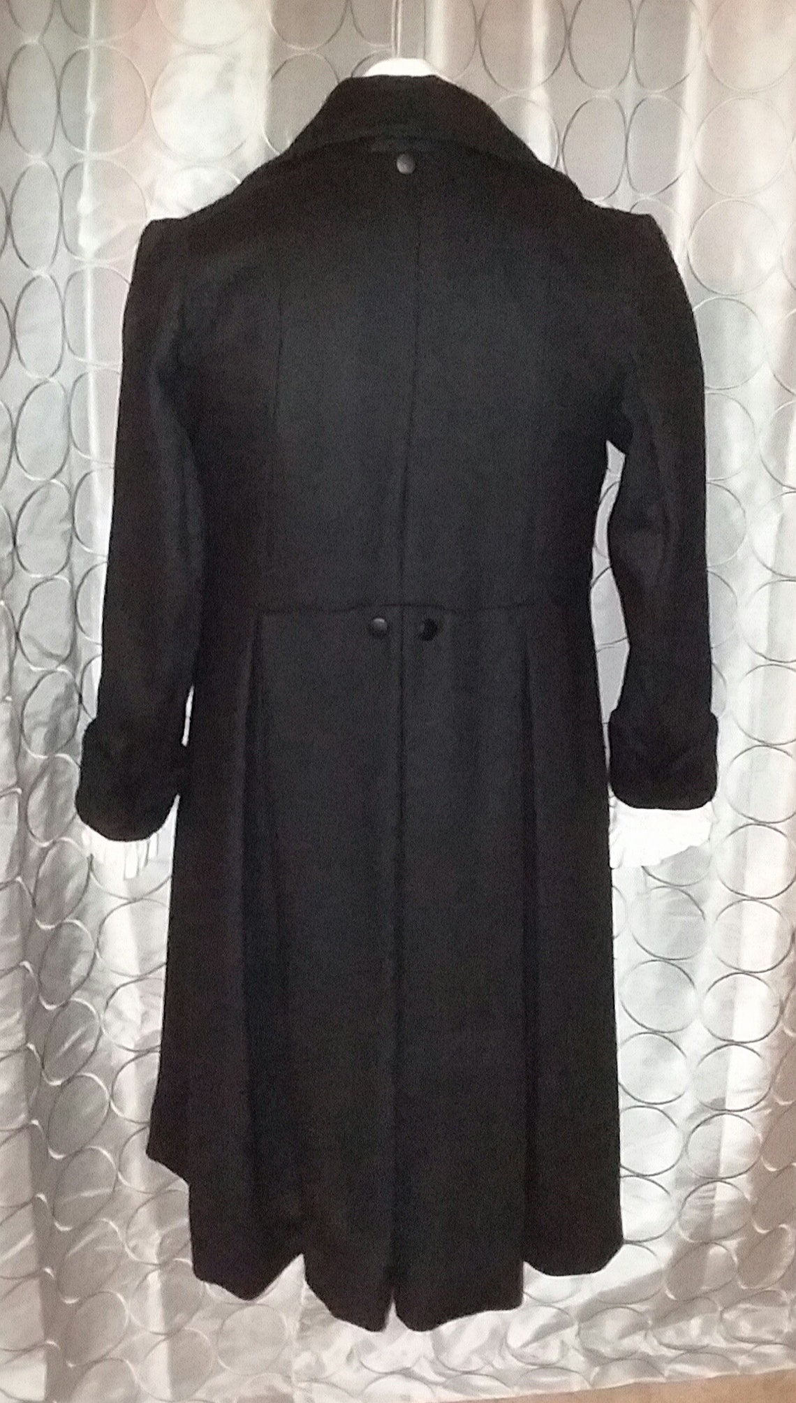 Single-breasted coat with English collar