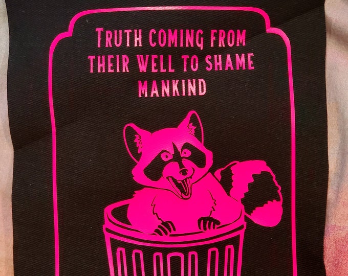 Backpatch: raccoon truth coming from their well to Shame mankind