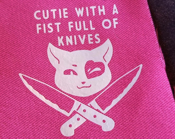 Patches: Cutie with a fist full of knives