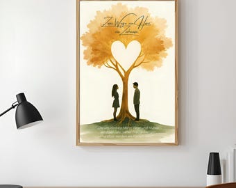 May include: A framed art print featuring a stylized tree with a heart-shaped opening in the center. Two figures stand beneath the tree. The artwork includes German text at the top and bottom, with a warm color palette.