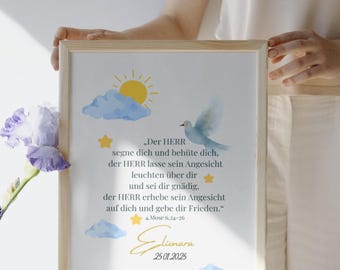 May include: A framed print with a light wood frame. The artwork features a dove, sun, clouds, and stars in watercolor style. Text in German reads "Der HERR segne dich..." with a name and date at the bottom. The print is held by a person.