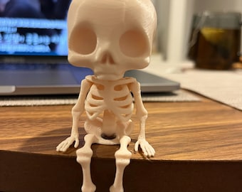 Cute Sitting Skeleton Toy Figurine, Evil but Adorabl