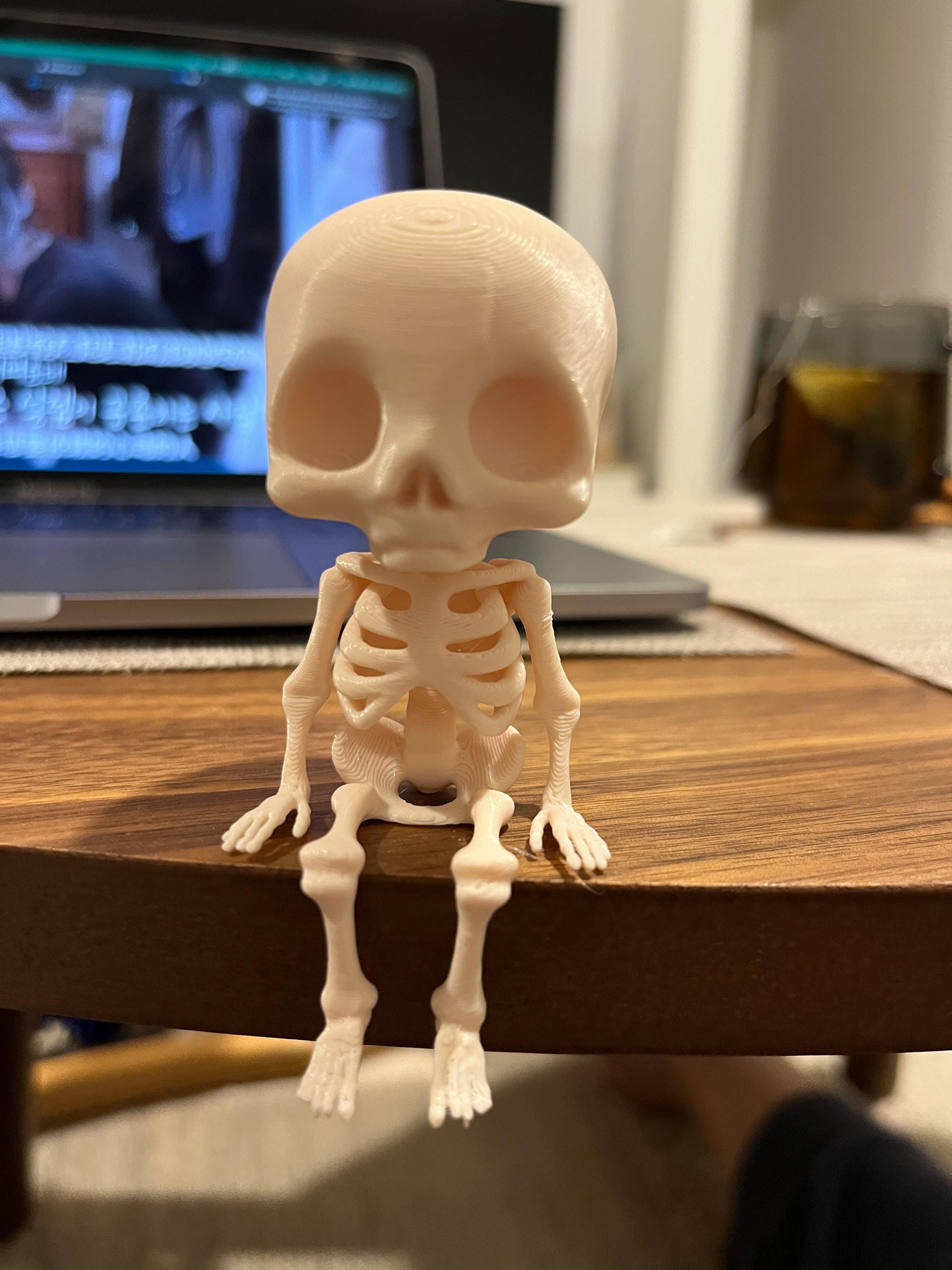 Cute Sitting Skeleton Toy Figurine, Evil but Adorabl