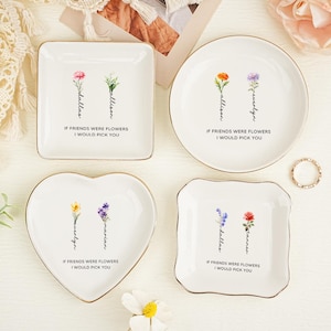 May include: Four white ceramic trinket dishes with gold-toned rims in square, round, heart, and scalloped shapes. Each dish features watercolor-style flower illustrations, personalized names, and the text IF FRIENDS WERE FLOWERS I WOULD PICK YOU.