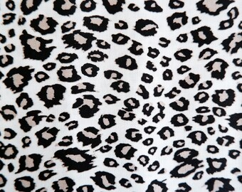 Cotton small snow leopard print fabric  - By the half metre - Riley Blake design