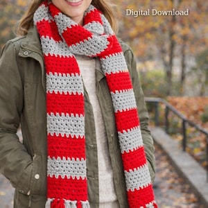 May include: A red and grey striped crochet scarf with tassels. The scarf is worn by a person wearing a green jacket and a cream-coloured beanie. The image includes the text "Crochet Scarf Pattern - Digital Download."