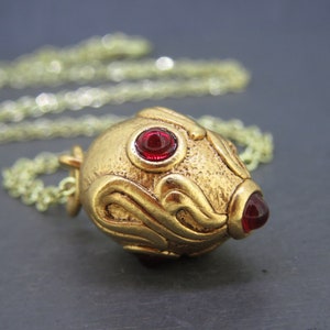 Vintage Joan Rivers Egg Pendant Necklace with Red Glass Stones on 18&quot; Gold Tone Chain