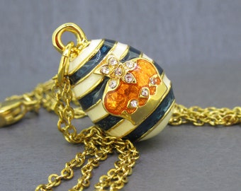 Vintage Joan Rivers Striped Enamel Egg Pendant Necklace with Navy Blue and White Enamel on 18" Gold Tone Chain, Crown Egg