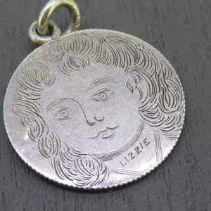 Rare Antique Sterling Love Token Charm or Pendant, Engraved with Detailed Face Portrait of Lizzie, 1890 Seated Liberty Dime