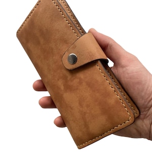 Cartera de piel marrón y beige para mujer