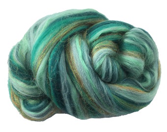 May include: A bundle of green and gold merino wool roving with a subtle shimmer. The roving is arranged in a loose, swirling shape.