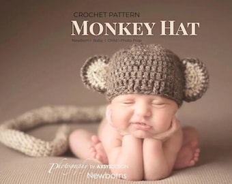 May include: A newborn baby wearing a crocheted monkey hat with large ears, lying on a neutral-toned surface. The hat is brown with tan accents. The image includes the text "CROCHET PATTERN MONKEY HAT Newborn | Baby | Child | Photo Prop."
