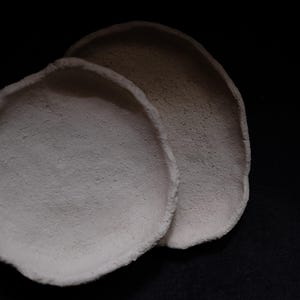 White Ceramic Dishes Made From Raw Clay