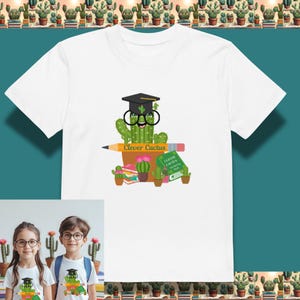 May include: White t-shirt with a cartoon cactus wearing a mortarboard and glasses, with the text "Clever Cactus". The design includes a pencil, potted cacti, and a book. A fun, educational theme.