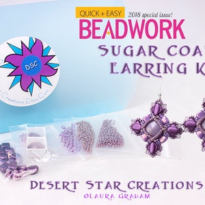 May include: A beadwork kit for making sugar coated earrings. The kit includes all the beads, findings, and instructions needed to make a pair of earrings. The earrings are purple and have a cross shape. The kit is from Desert Star Creations.