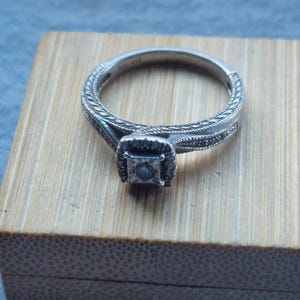 930 Solid Silver 0.15 ct Diamond Solitaire Twist Ring UK Size O and a half
