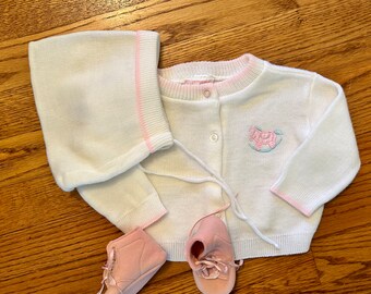 Midcentury baby girl sweater and bonnet set, white acrylic, pink trim, rocking horse, 0 - 6 months