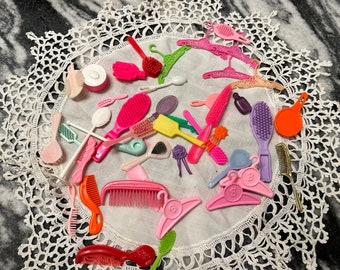 Vintage Barbie accessories, 80's - 90's, hangers, combs, movie camera etc.