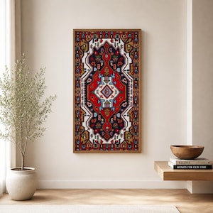 May include: A rectangular wall art piece featuring a vibrant, intricate pattern with a central red diamond motif, surrounded by black, white, and gold geometric shapes and floral elements, all enclosed within a simple, light-toned wooden frame.