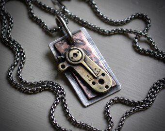 Moment in Time - Steampunk Necklace - Handcrafted artisan designed Sterling Silver, Copper and vintage clock gear necklace - Industrial