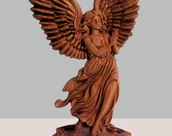 May include: A detailed wooden sculpture of an angel with outstretched wings. The angel is depicted in a flowing gown, with intricate carvings in the wings and dress. The sculpture is mounted on a star-shaped base, all in a warm brown tone.