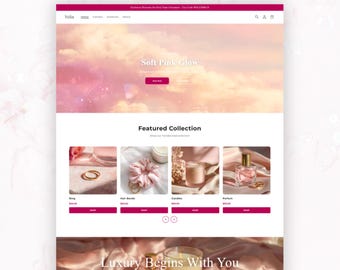 May include: A website interface for Velin featuring a pink cloud banner with the text Soft Pink Glow. The page displays a featured collection of rings, hair bands, candles, and perfume, with a footer section titled Luxury Begins With You.